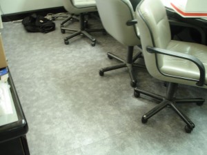 Office chairs arranged on a carpeted floor.