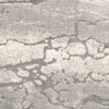 Abstract textured pattern resembling cracked stone or bark.