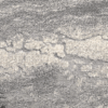 Close-up of textured gray and white stone surface with natural patterns.