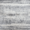 Abstract gray and white textured pattern with horizontal streaks.
