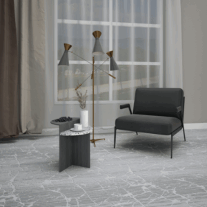 Modern living room with a black chair and marble-patterned carpet.